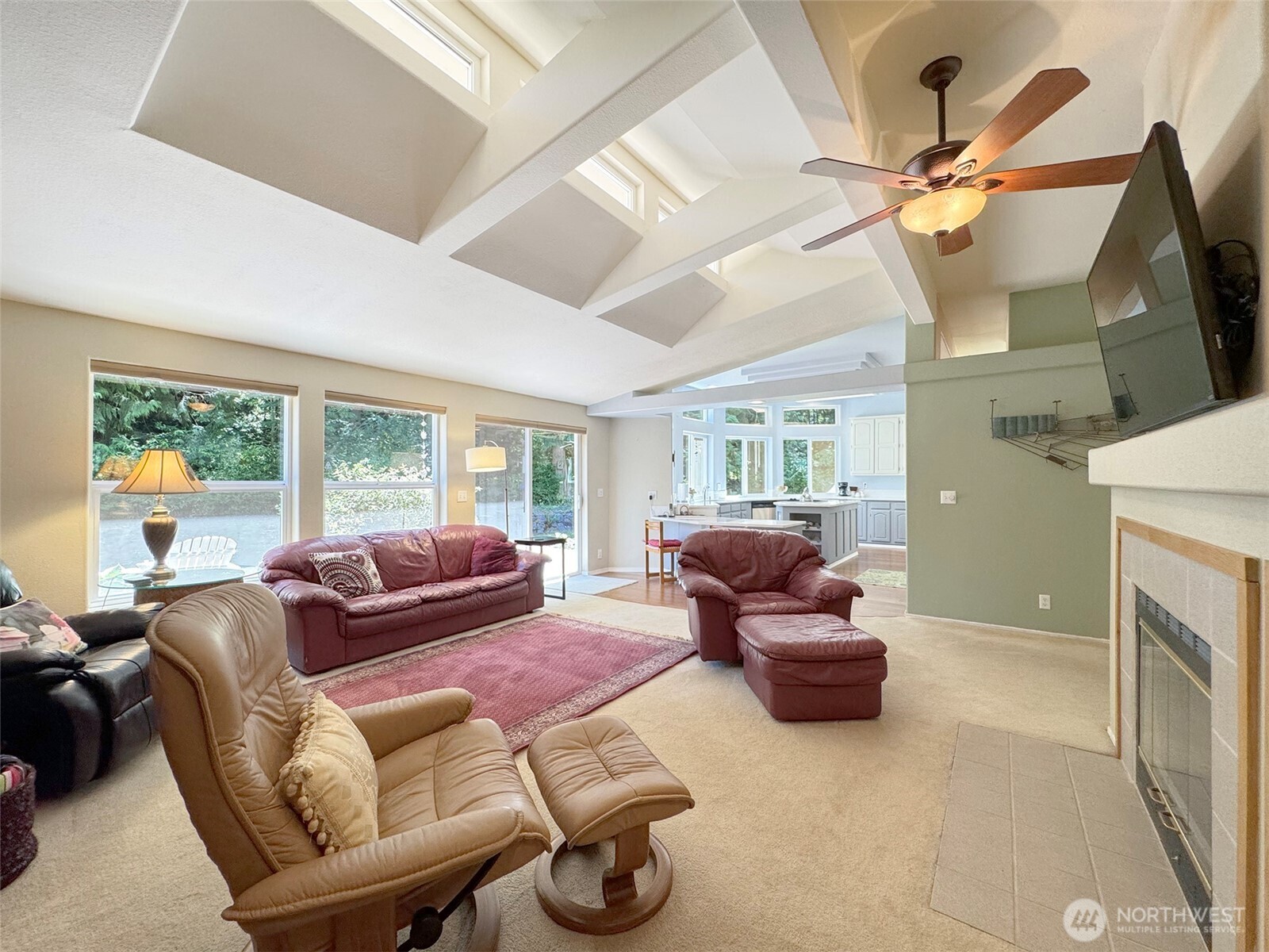 77 Rd Less Traveled Way Sequim, WA 98382 - Photo 4 of 40 a living room with furniture and a fireplace