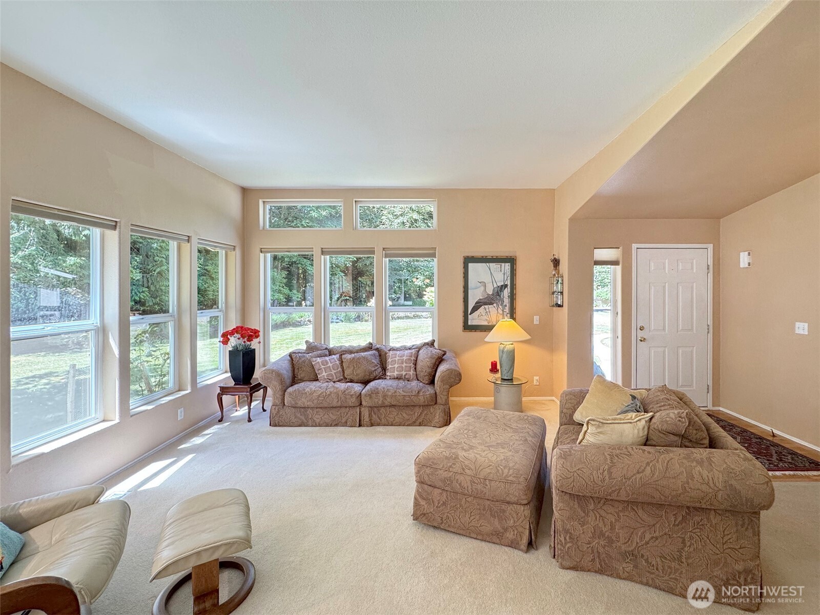 77 Rd Less Traveled Way Sequim, WA 98382 - Photo 7 of 40 a living room with furniture and a large window