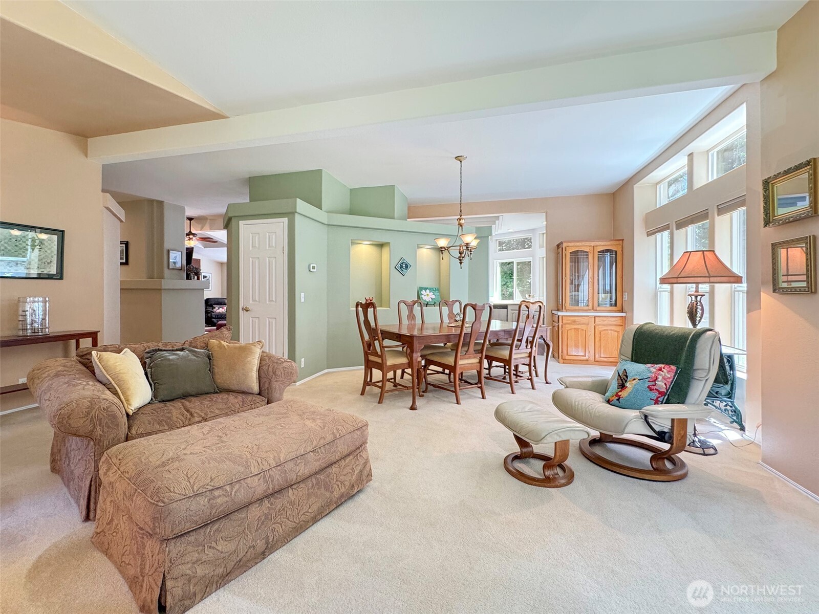 77 Rd Less Traveled Way Sequim, WA 98382 - Photo 9 of 40 a living room with furniture and a large window
