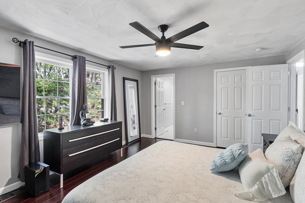 10 Station Road Salem, MA 01970 - Photo 13 of 37 a bedroom with a bed and a large window