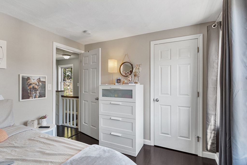 10 Station Road Salem, MA 01970 - Photo 19 of 37 a bedroom with a bed and a cabinets