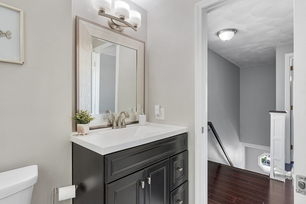 10 Station Road Salem, MA 01970 - Photo 21 of 37 a bathroom with a sink vanity and a mirror