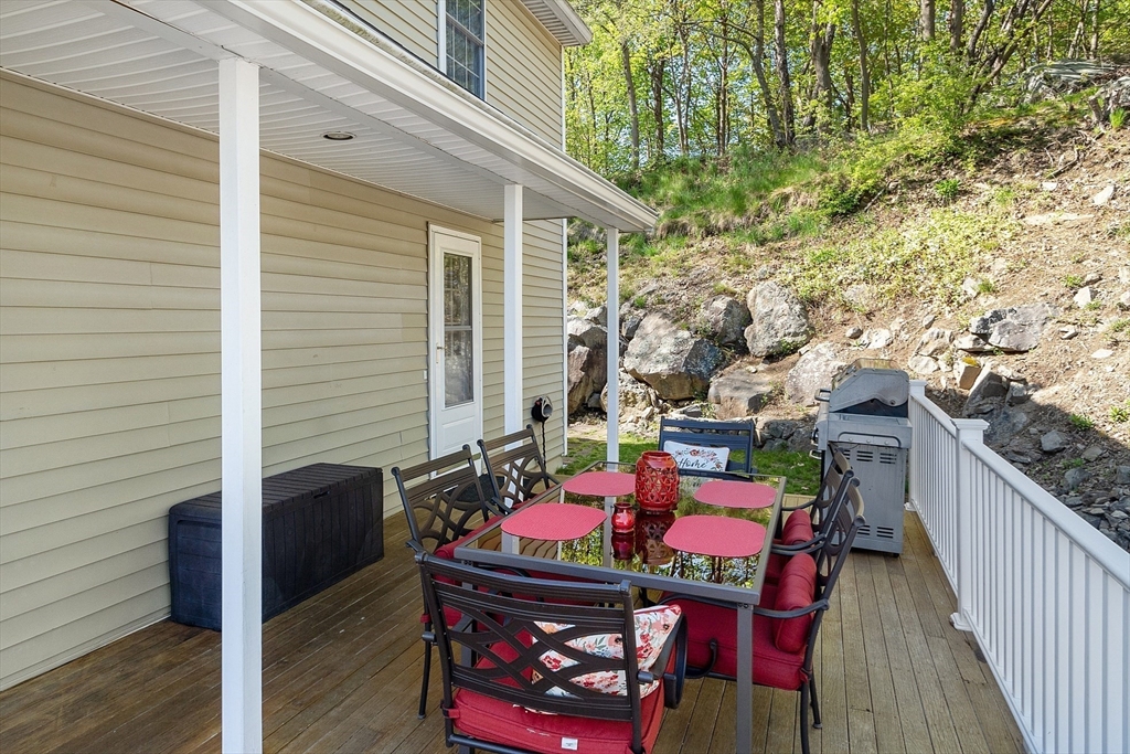 10 Station Road Salem, MA 01970 - Photo 27 of 37 a view of a chairs and table in the balcony