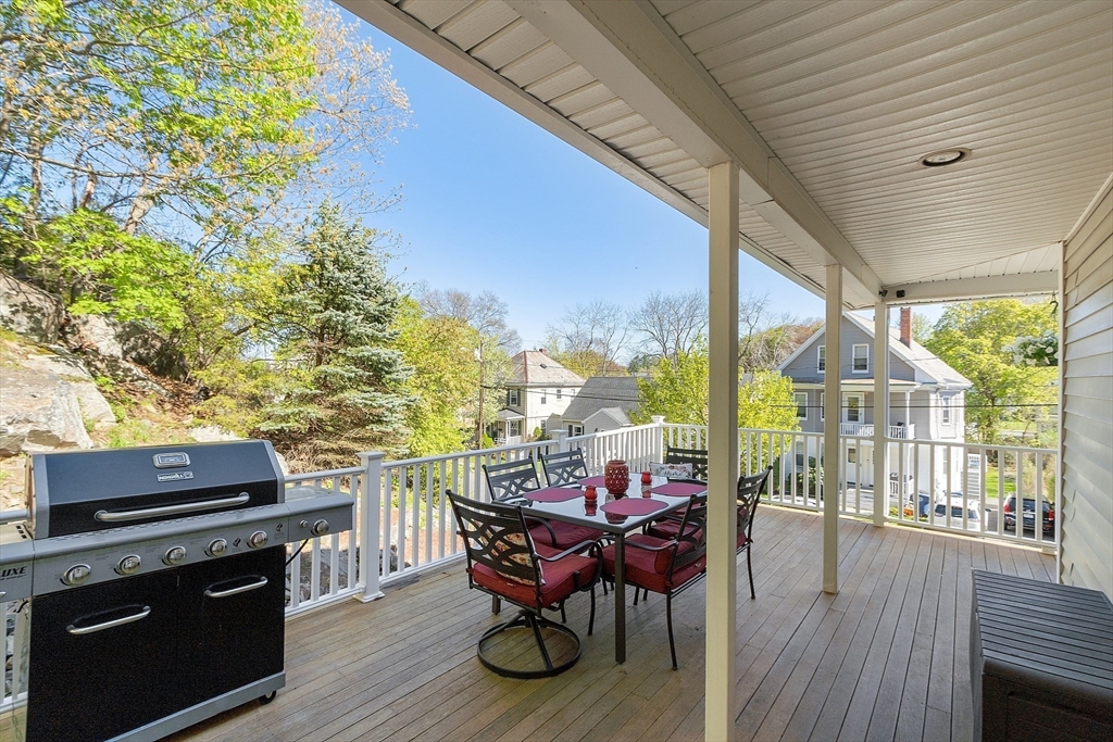 10 Station Road Salem, MA 01970 - Photo 28 of 37 a view of a balcony with furniture and wooden floor