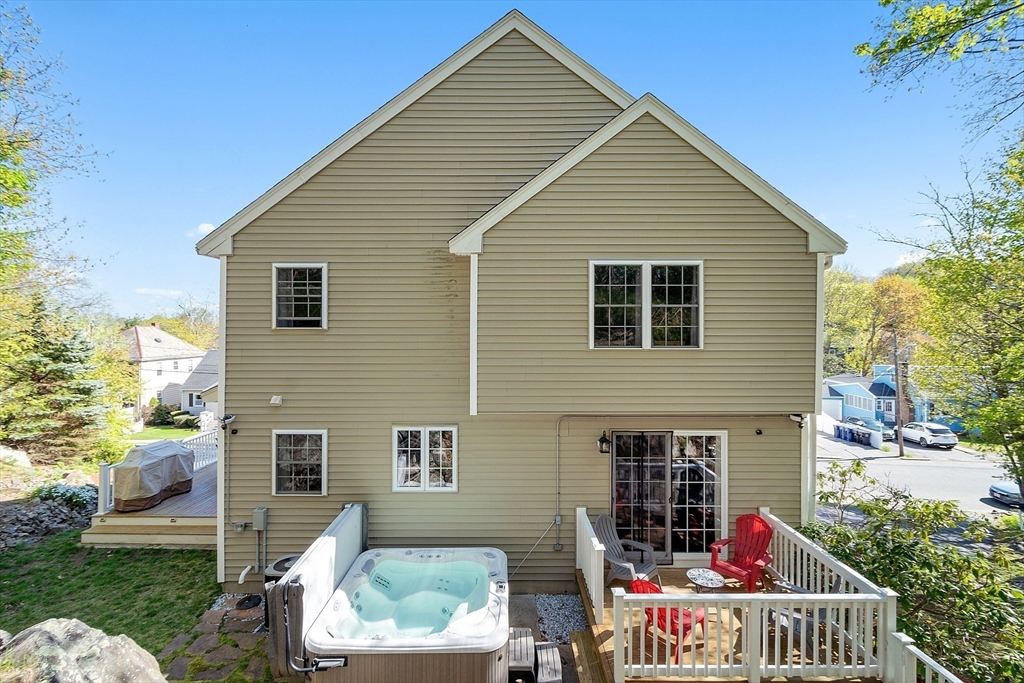10 Station Road Salem, MA 01970 - Photo 29 of 37 a view of a house with a yard and furniture