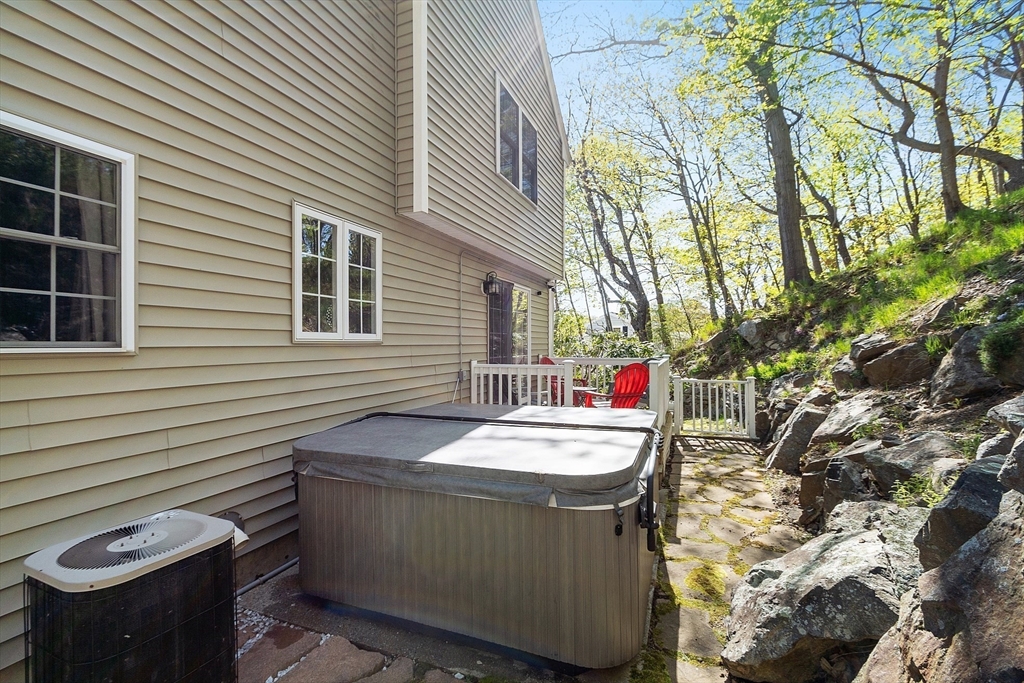 10 Station Road Salem, MA 01970 - Photo 30 of 37 a backyard of a house with fire pit and outdoor seating