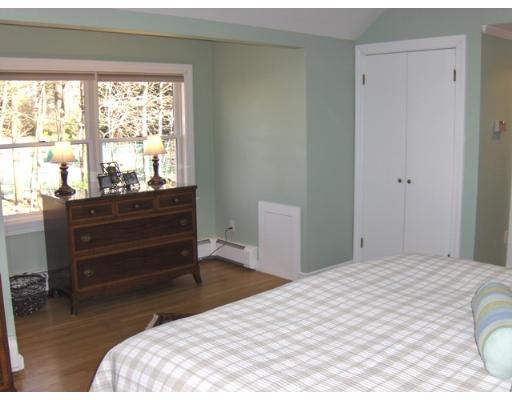 21 Washington Street Lexington, MA 02421 - Photo 12 of 21 a bedroom with a bed and a window
