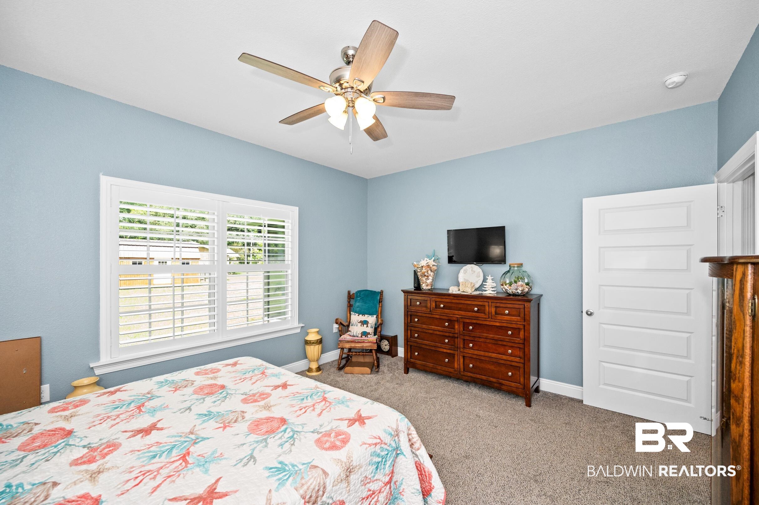 1700 South Juniper Street Foley, AL 36535 - Photo 30 of 51 Carpeted bedroom with ceiling fan