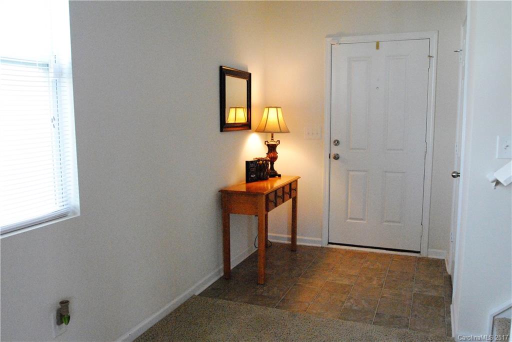9203 Yellow Oak Road Charlotte, NC 28227 - Photo 2 of 17 a view of a room with a table and mirror