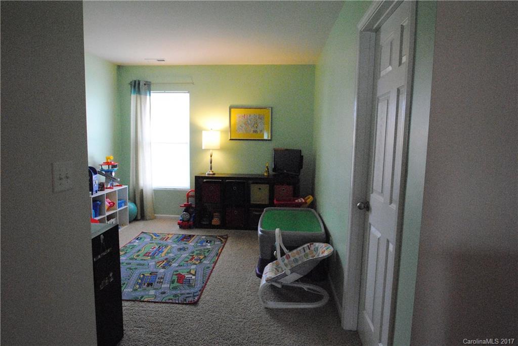 9203 Yellow Oak Road Charlotte, NC 28227 - Photo 11 of 17 a living room with furniture and a wooden floor