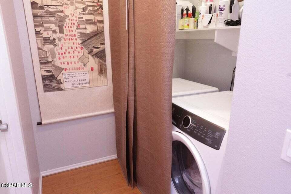 2388 Royal Avenue, Unit 26 Simi Valley, CA 93065 - Photo 8 of 11 a utility room with dryer and washer