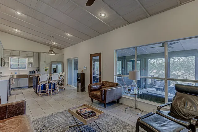 a view of a chairs and table in the patio