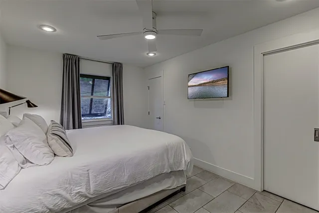 a kitchen with stainless steel appliances a stove a microwave and cabinets