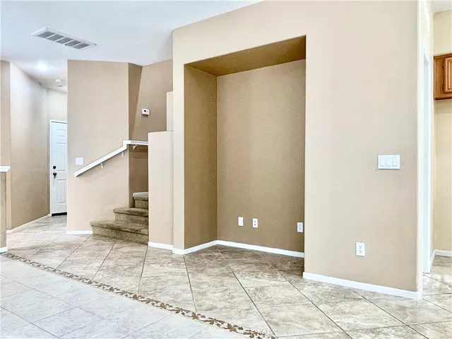 a view of a hallway with natural light