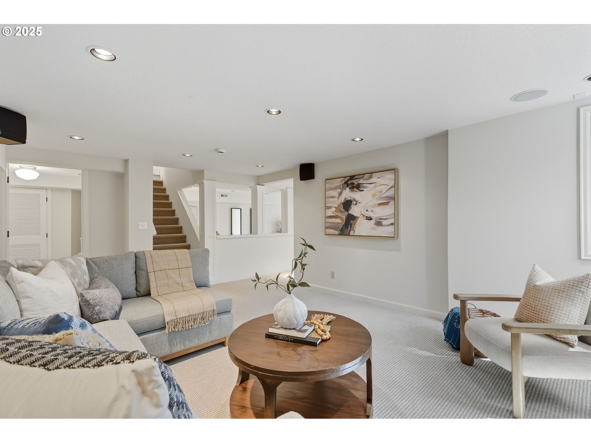 3190 Southwest Ridgewood Avenue Portland, OR 97225 - Photo 29 of 41 a living room with furniture and a wooden floor