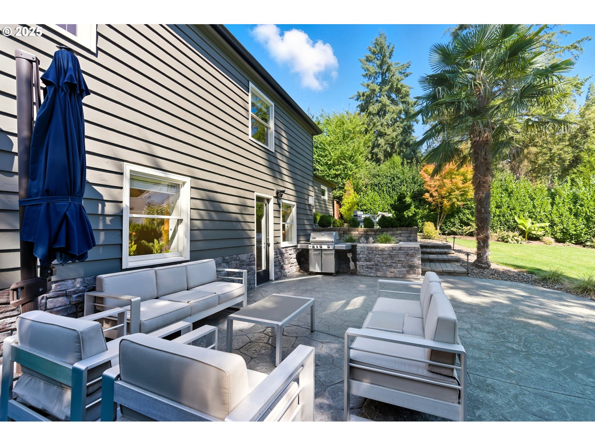 3190 Southwest Ridgewood Avenue Portland, OR 97225 - Photo 35 of 41 a view of the patio with couches and a fire pit