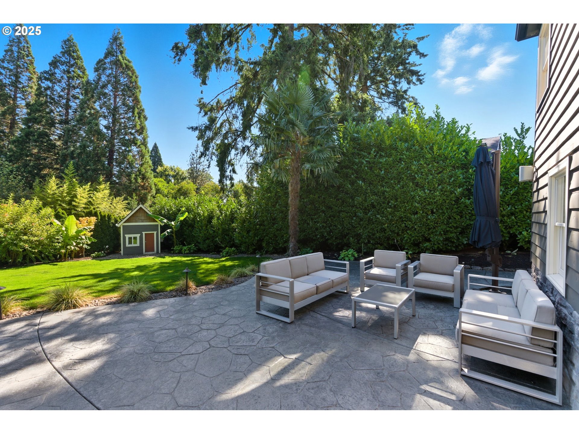 3190 Southwest Ridgewood Avenue Portland, OR 97225 - Photo 36 of 41 a view of a garden with patio