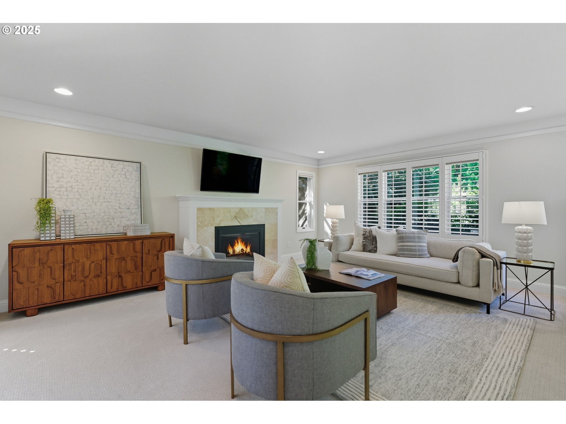 3190 Southwest Ridgewood Avenue Portland, OR 97225 - Photo 5 of 41 a living room with furniture a fireplace and a flat screen tv