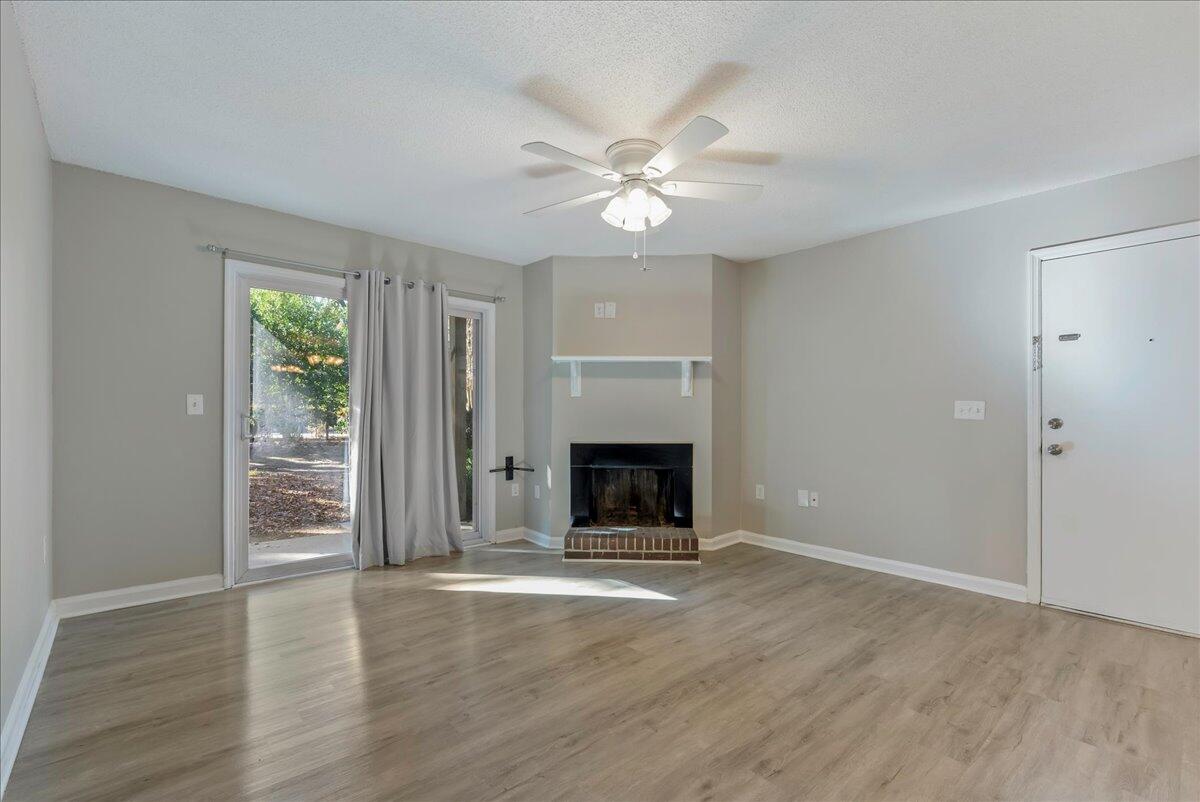 1402 Camp Road, Unit 3A Charleston, SC 29412 - Photo 6 of 28 Family Room with Fireplace
