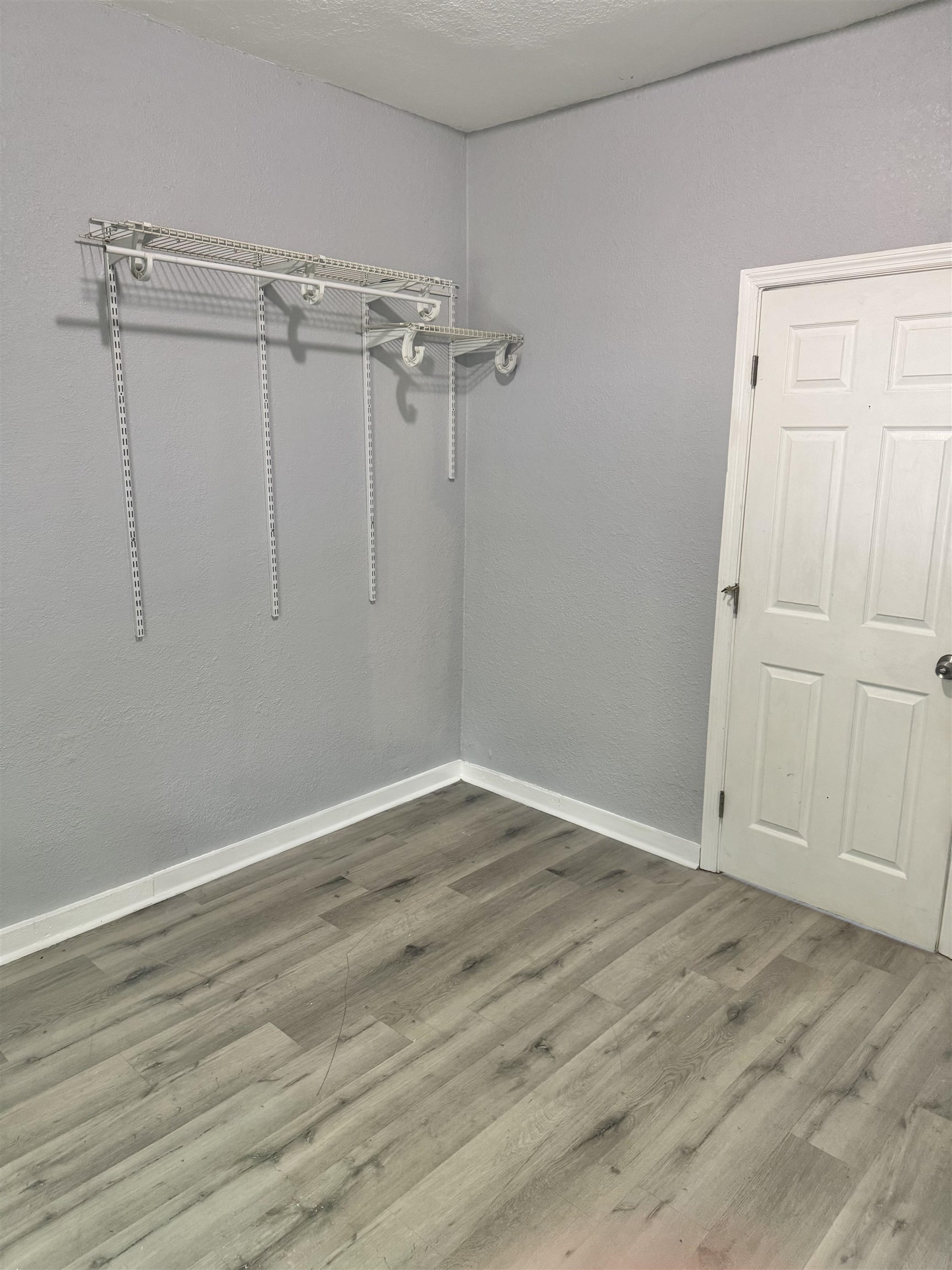 38 Palmer Street St. Augustine, FL 32084 - Photo 11 of 14 wooden floor in an empty room