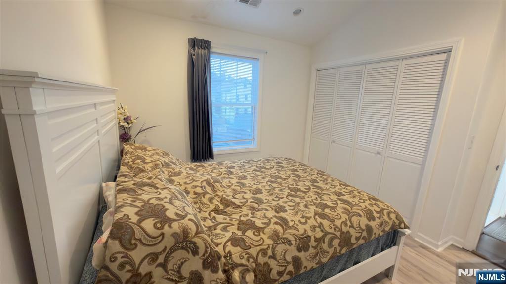 246 Harding Avenue Clifton, NJ 07011 - Photo 11 of 28 a bedroom with a bed and a rug