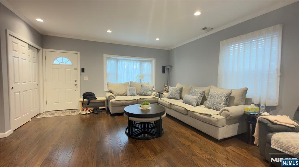246 Harding Avenue Clifton, NJ 07011 - Photo 3 of 28 a living room with furniture and a wooden floor