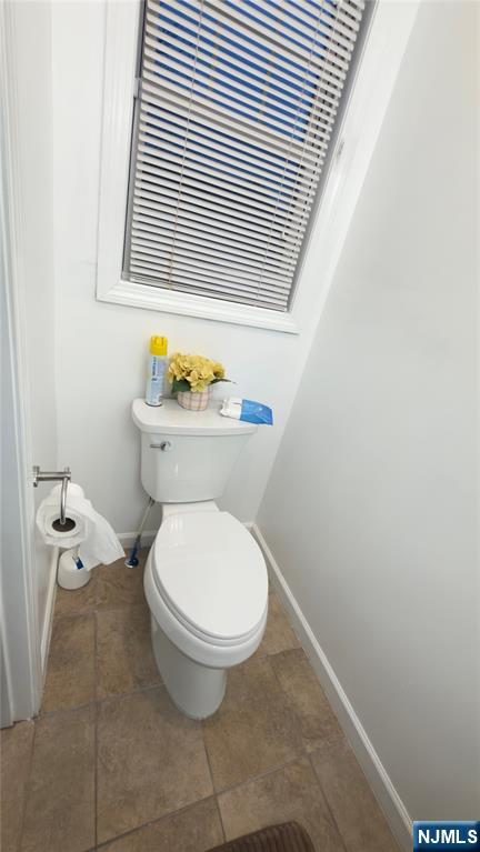 246 Harding Avenue Clifton, NJ 07011 - Photo 7 of 28 a bathroom with a toilet and a sink