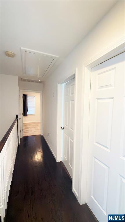246 Harding Avenue Clifton, NJ 07011 - Photo 10 of 28 a view of an empty room and wooden floor