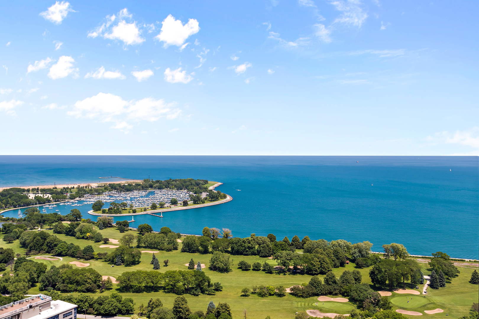 655 West Irving Park Road, Unit 4509 Chicago, IL 60613 - Photo 12 of 22 an aerial view of ocean and residential houses with outdoor space