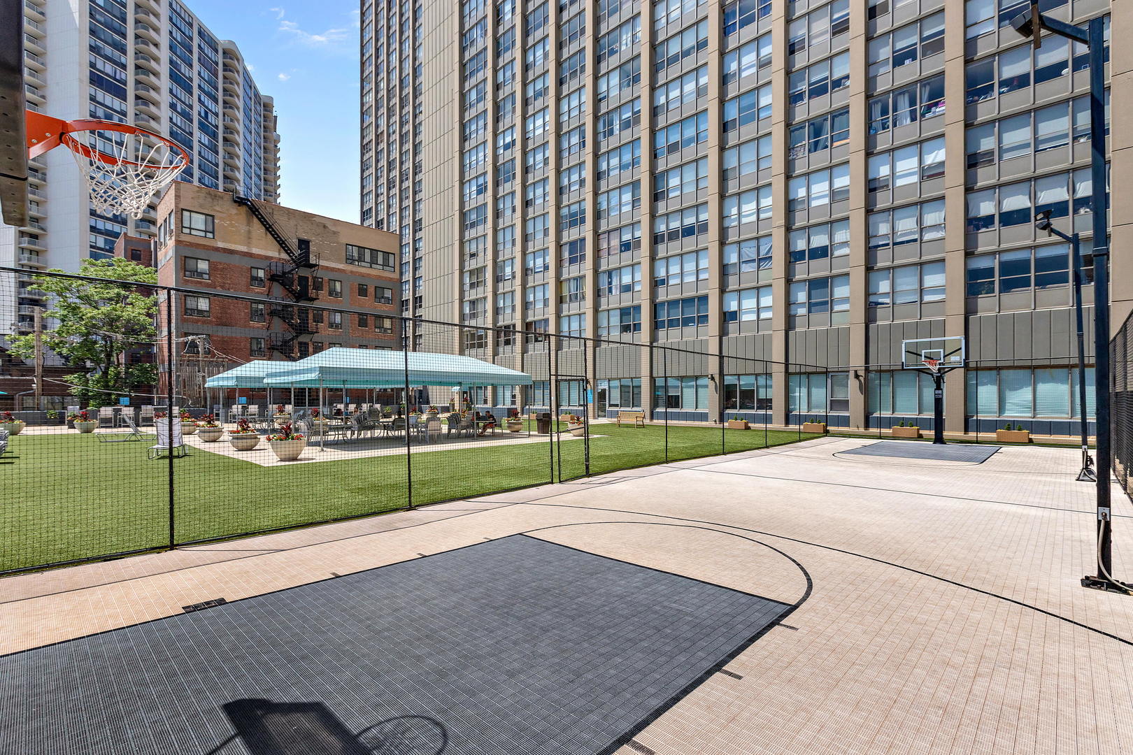 655 West Irving Park Road, Unit 4509 Chicago, IL 60613 - Photo 16 of 22 a view of a building with a street