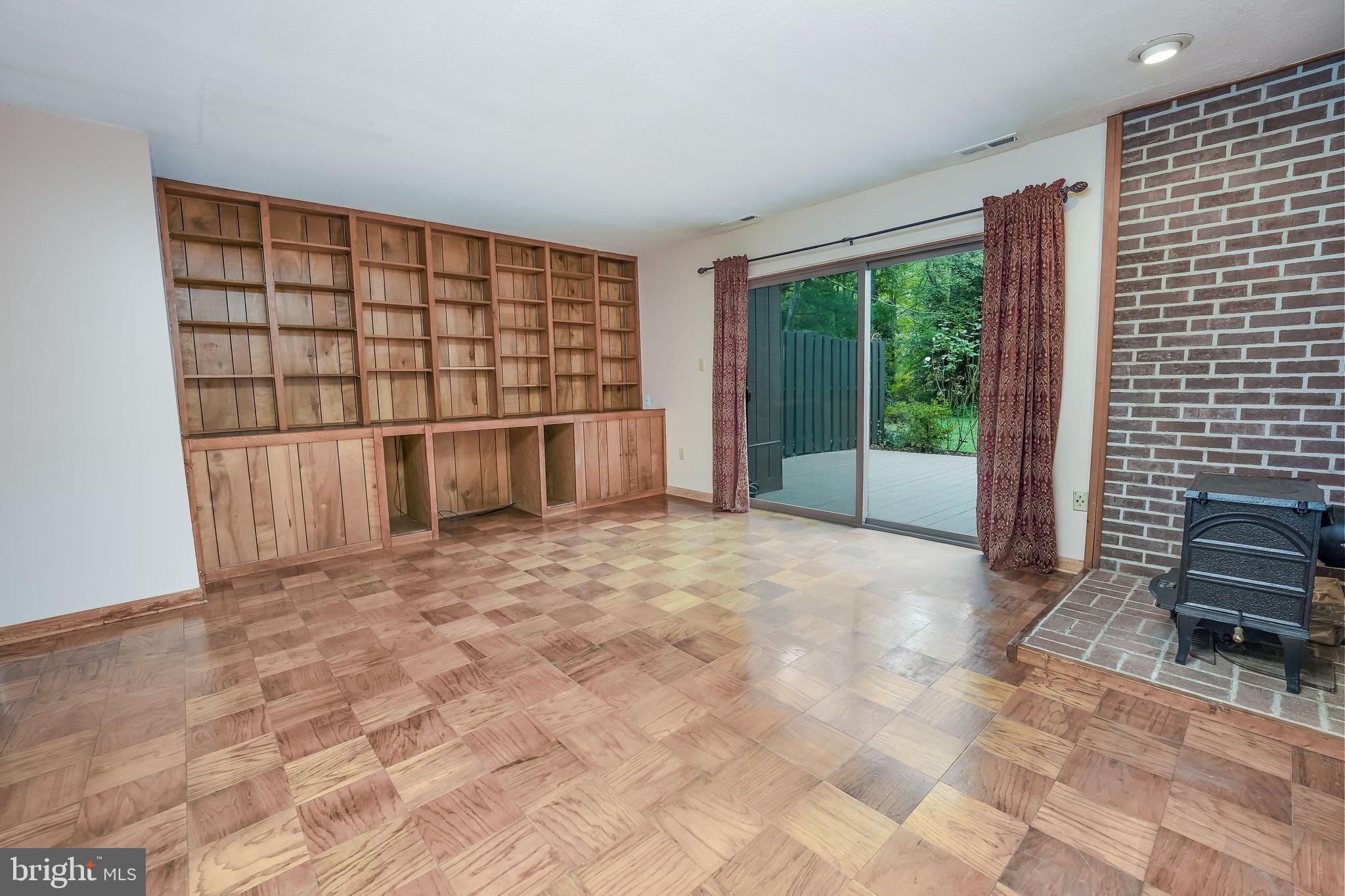 1300 Northgate Square Reston, VA 20190 - Photo 10 of 46 Family Room with Built-in bookshelves