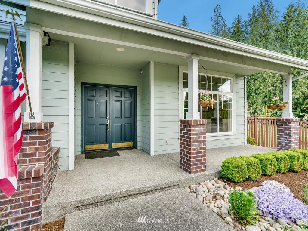 18718 Southeast 144th Street Renton, WA 98059 - Photo 2 of 25 a front view of a house