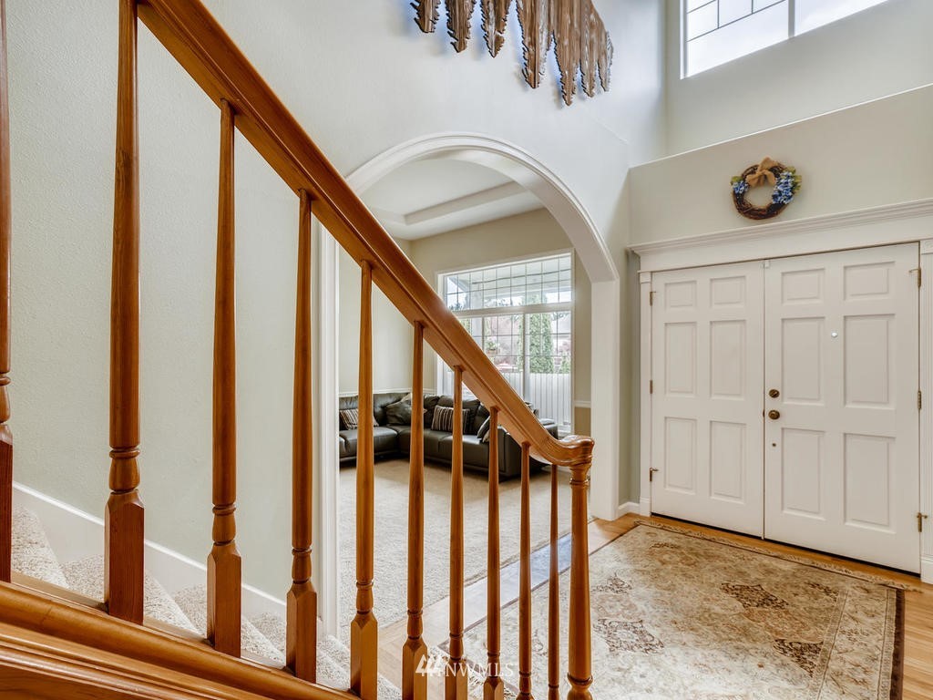 18718 Southeast 144th Street Renton, WA 98059 - Photo 3 of 25 a view of an entryway with wooden floor