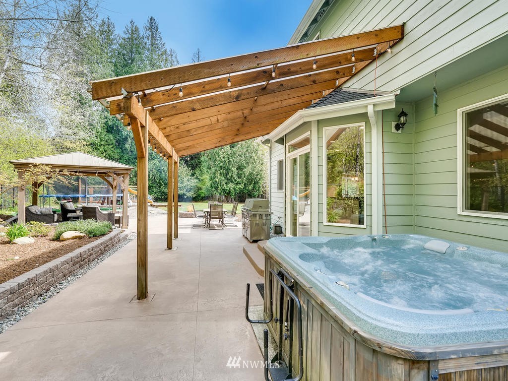 18718 Southeast 144th Street Renton, WA 98059 - Photo 23 of 25 a view of house with outdoor seating