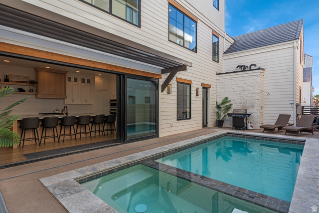 5367 Cyan Lane St. George, UT 84790 - Photo 43 of 49 Outdoor living space featuring a rectangular swimming pool with integrated spa
