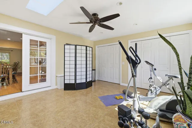 a work room with furniture and entryway