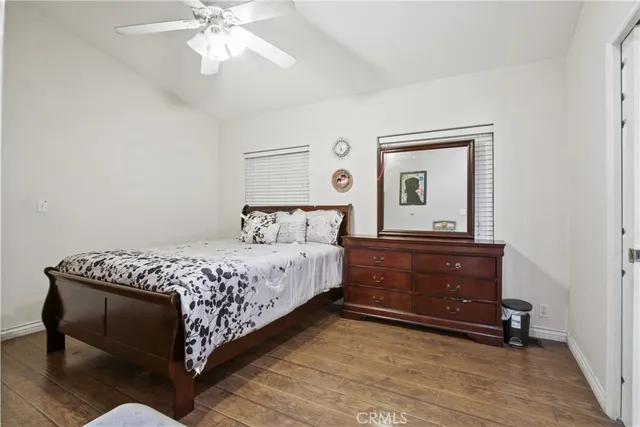 a view of walk in closet with clothes
