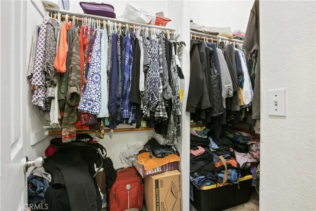 a room with furniture and white walls