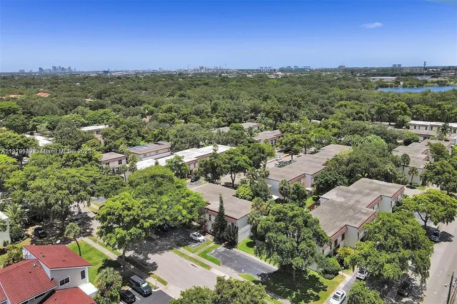 an aerial view of a city with lots of residential buildings