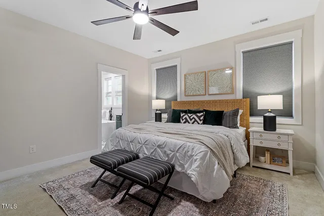 a bedroom with a bed and a dresser