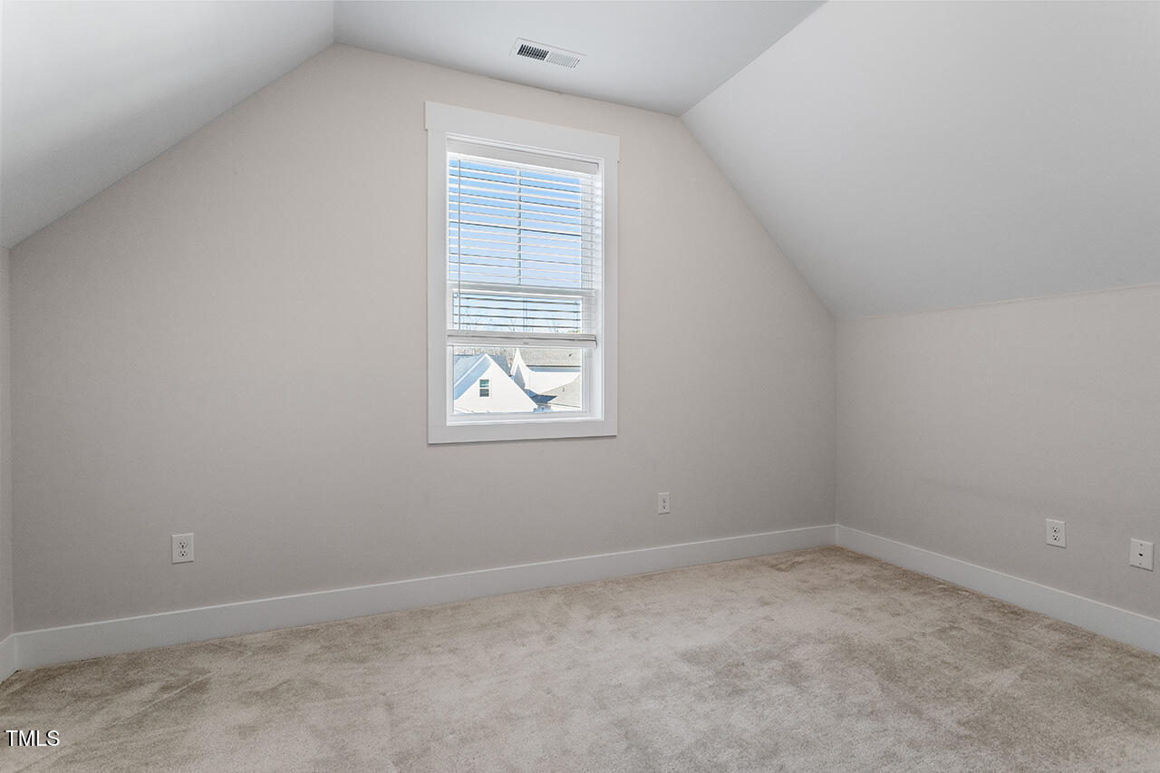 539 Vine Parkway Pittsboro, NC 27312 - Photo 28 of 35 an empty room with a window