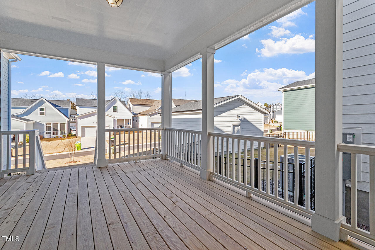 539 Vine Parkway Pittsboro, NC 27312 - Photo 35 of 35 a view of a balcony with wooden floor