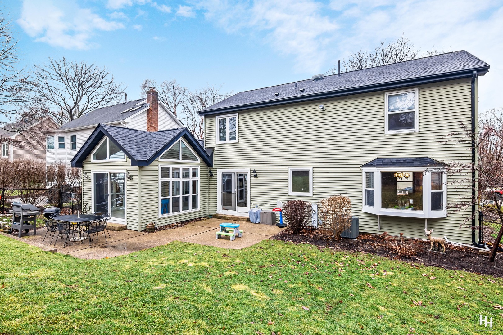 355 Hillhurst Drive Cary, IL 60013 - Photo 3 of 29 a front view of house with yard outdoor seating and barbeque oven