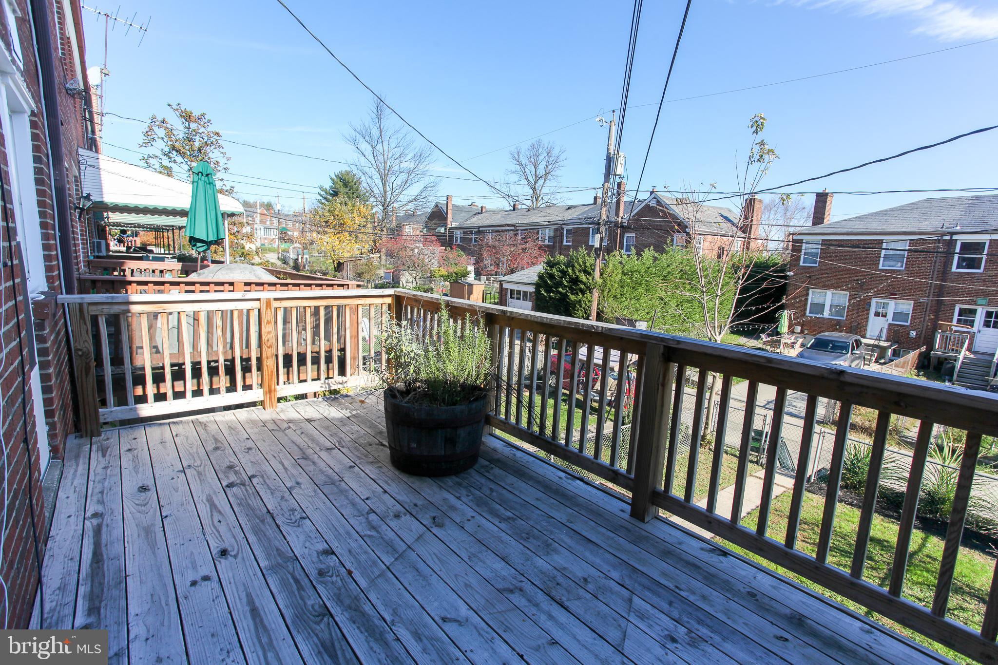 323 Greenlow Road Catonsville, MD 21228 - Photo 30 of 38 a view of a balcony with wooden floor