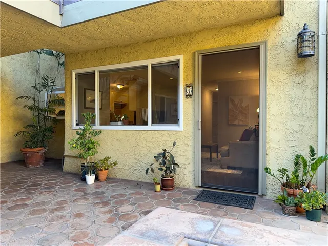 a view of a entryway door front of a building