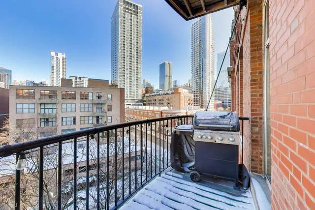 a view of a balcony with city view