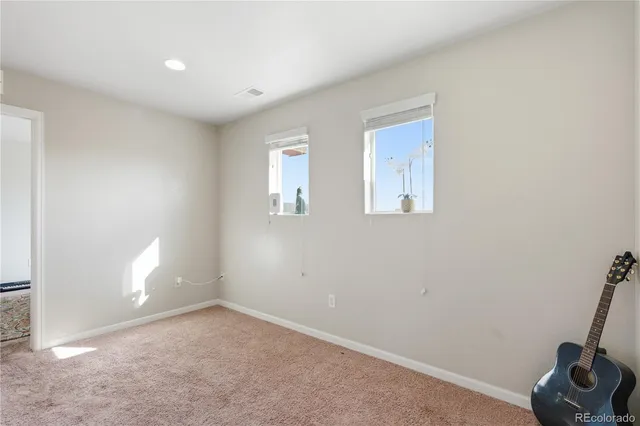 a view of entryway with bathroom