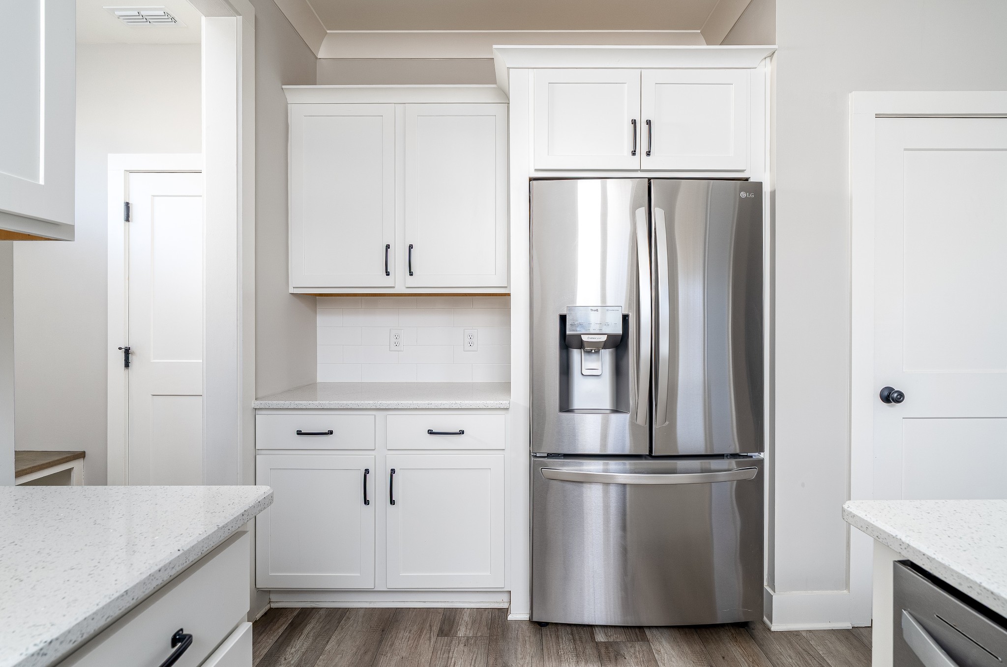 873 Preston Road Antioch, TN 37013 - Photo 11 of 36 a kitchen with white cabinets and stainless steel appliances