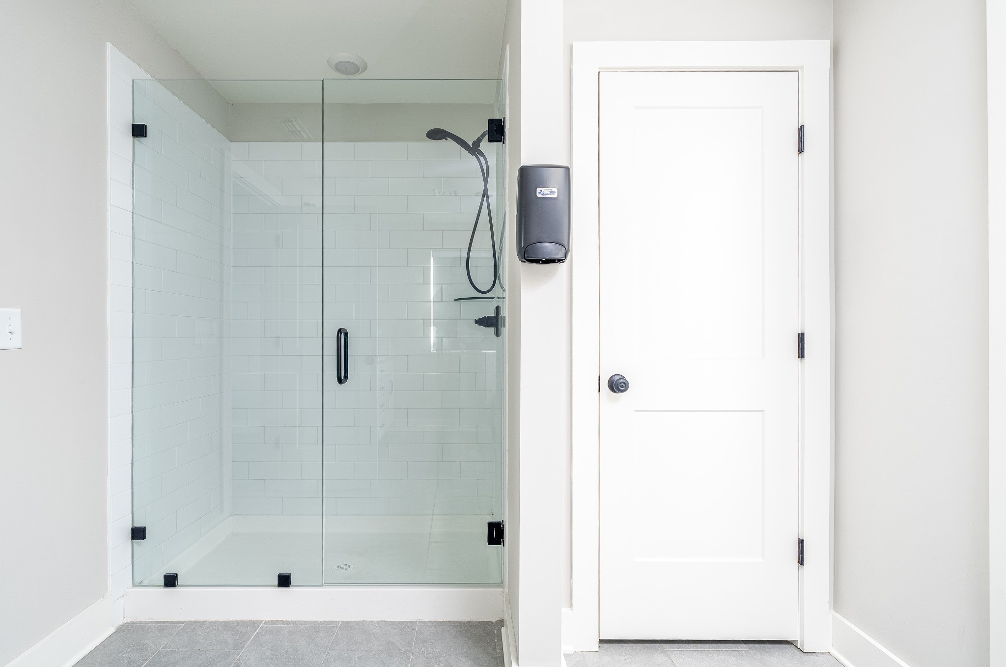 873 Preston Road Antioch, TN 37013 - Photo 21 of 36 a bathroom with a glass shower door