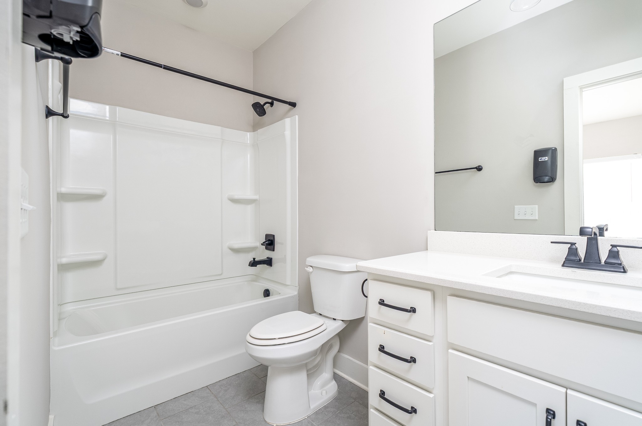873 Preston Road Antioch, TN 37013 - Photo 6 of 36 a bathroom with a sink a toilet and a bathtub